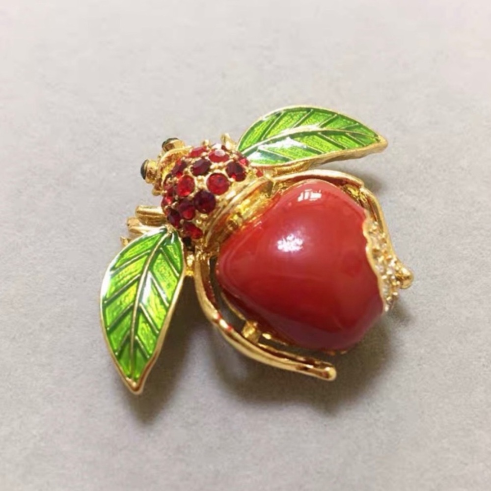 Joan Rivers big red apple bee brooch pin